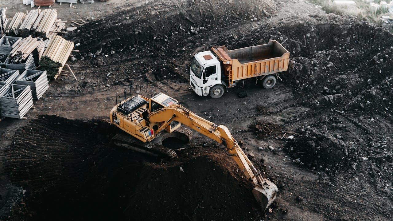 Crafting Captivating Headlines: Your awesome post title goes here Dump truck and excavator at an industrial construction site in Istanbul, Turkey.